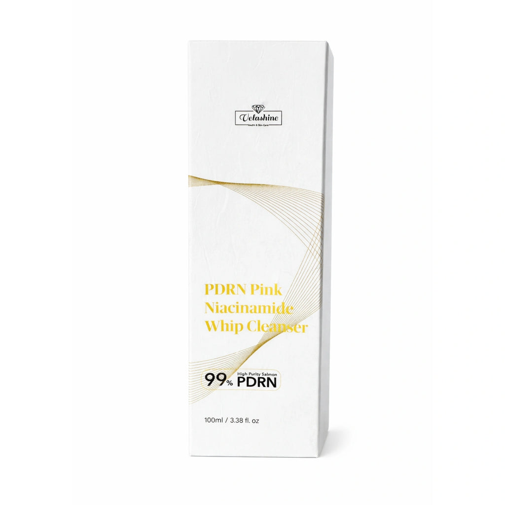 White box with gold accents containing a cosmetic product on a white background