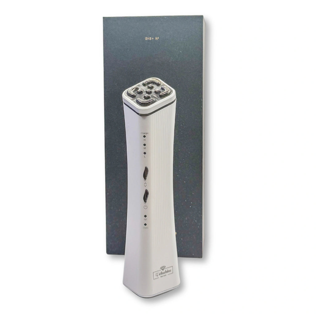 White electronic device with control panel and packaging on a white background