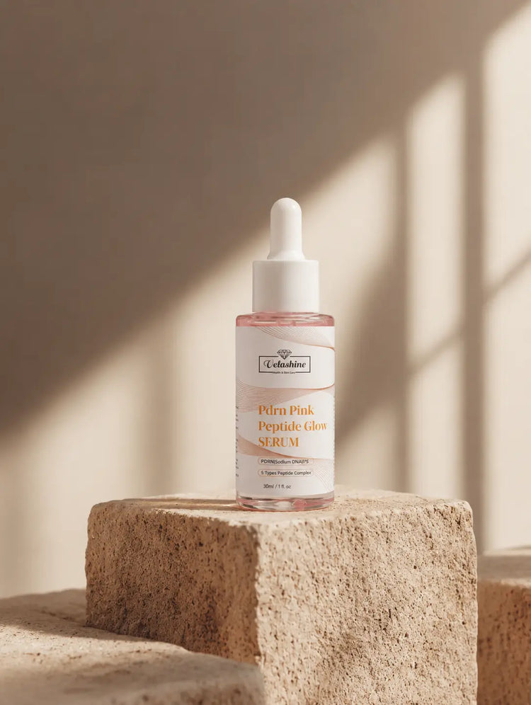 Skincare serum bottle on a textured surface with soft lighting