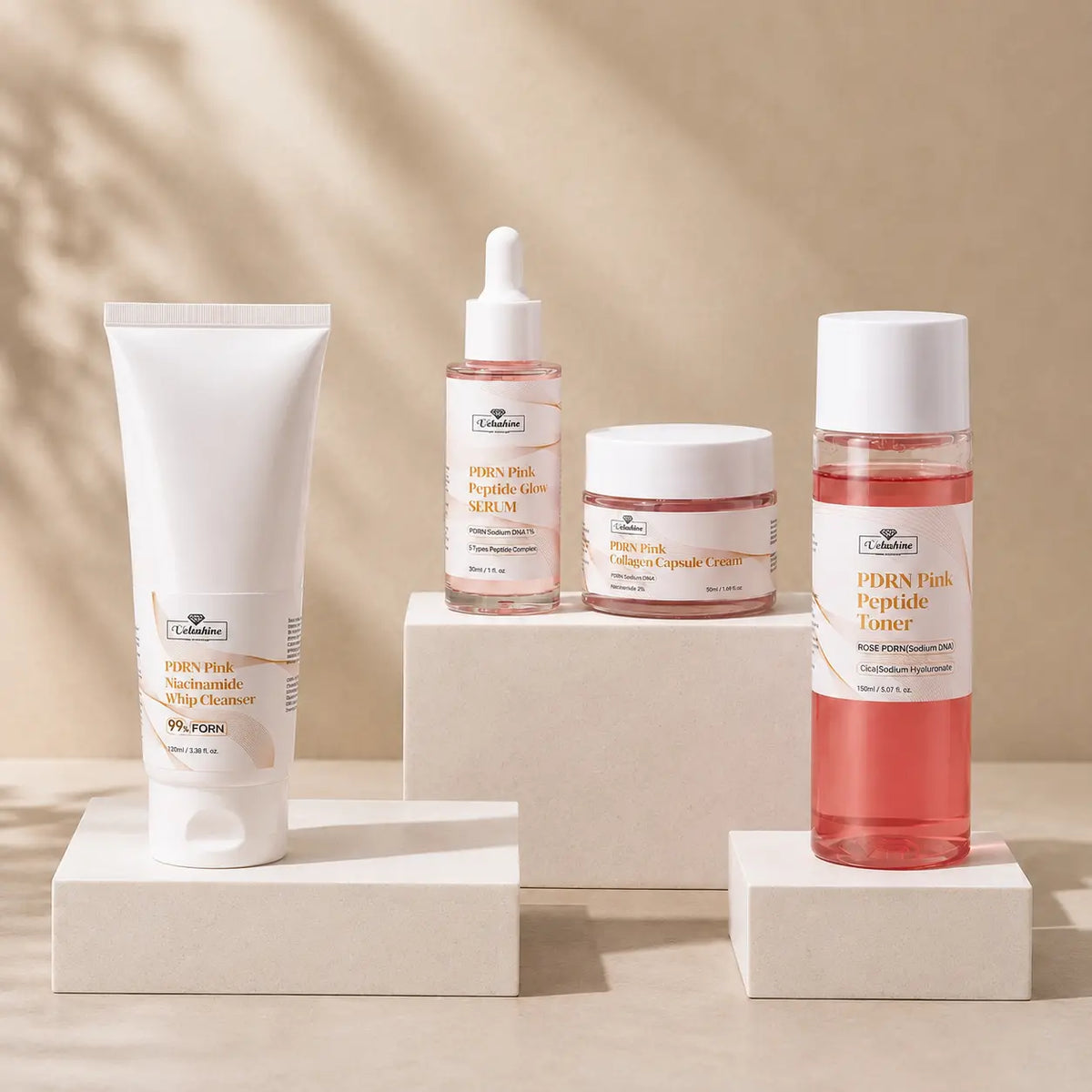 Set of skincare products including a tube, dropper bottle, and jars on a brown background