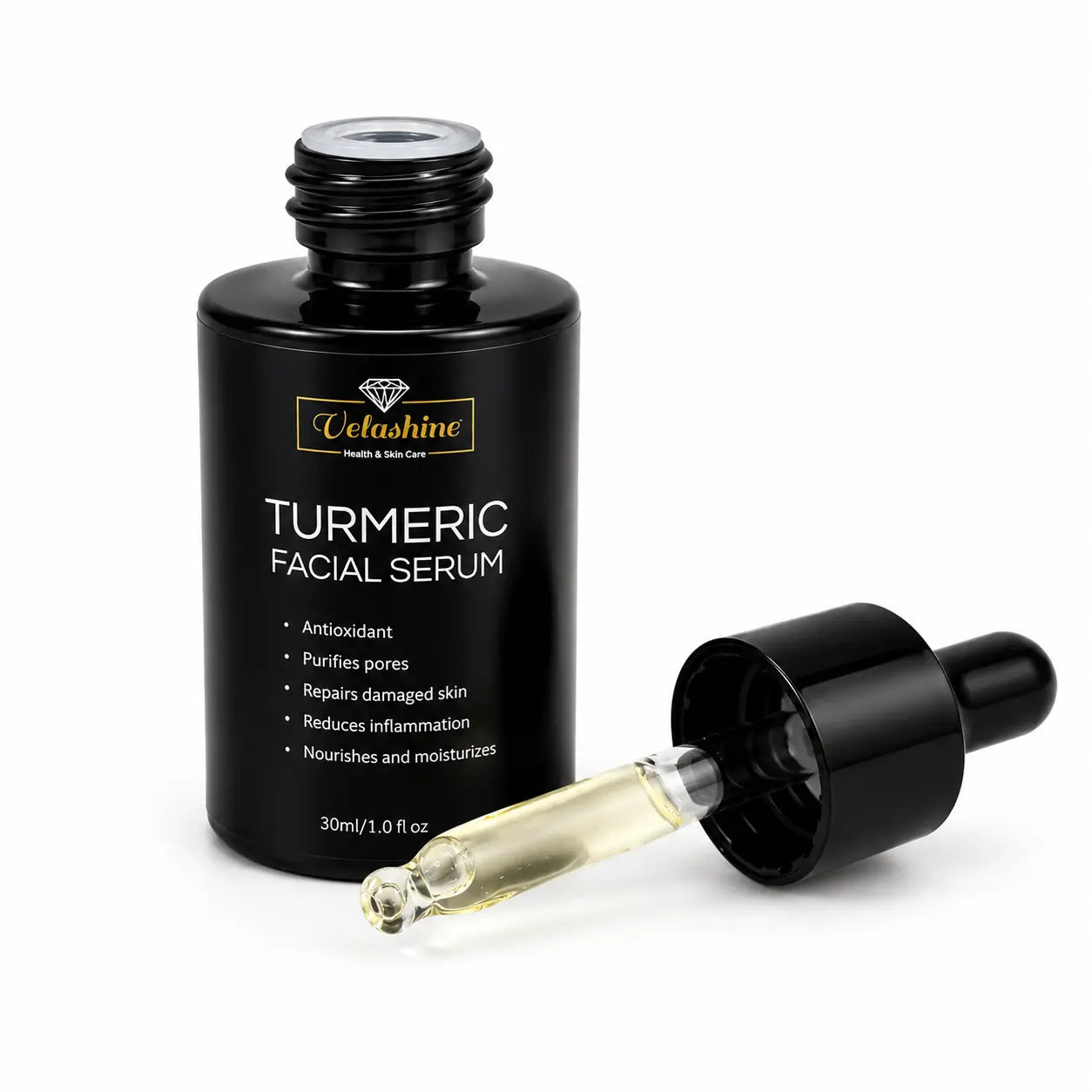Turmeric facial serum bottle with dropper on a white background