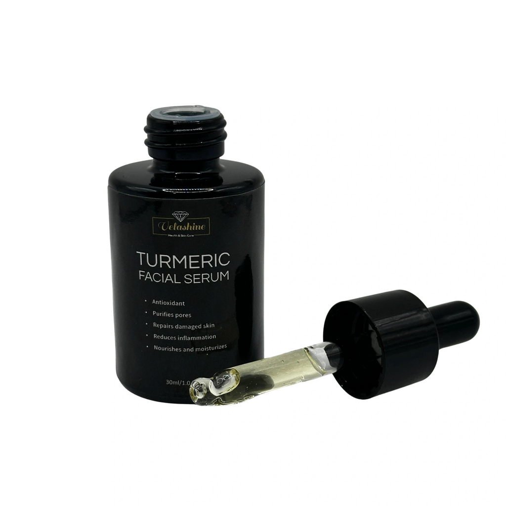 Black bottle of turmeric facial serum with dropper on a white background