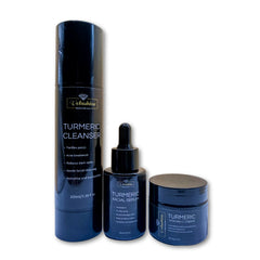 Set of Velashine Turmeric skincare products including cleanser, serum, and cream on a white background.